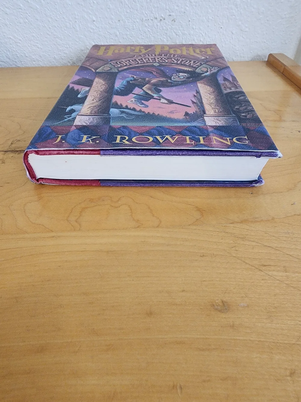 Harry Potter and the Sorcerer's Stone by J.K. Rowling - Purple Cover